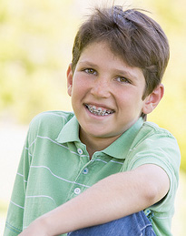 smiling boy with braces